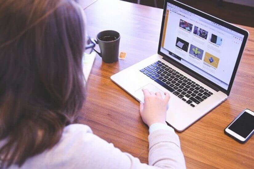 Start-up fulfilment: an entrepreneur planning their eCommerce venture on a laptop