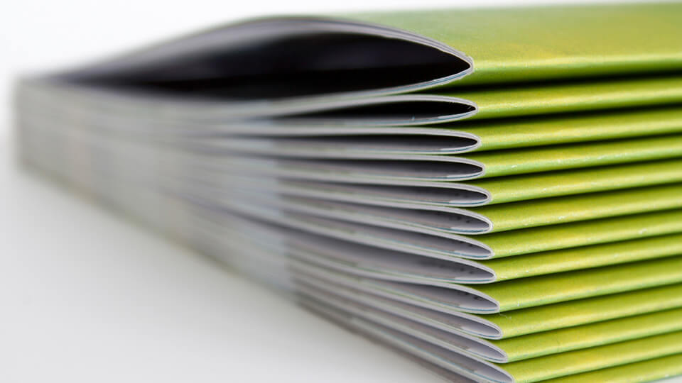 Stacked branding booklets
