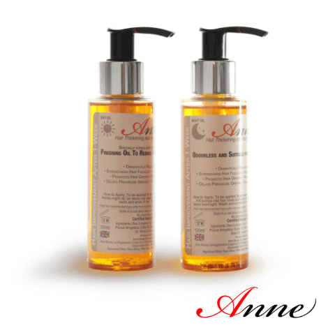 Bootles of Anne Beauty's day and night hair oils, with the Anne logo