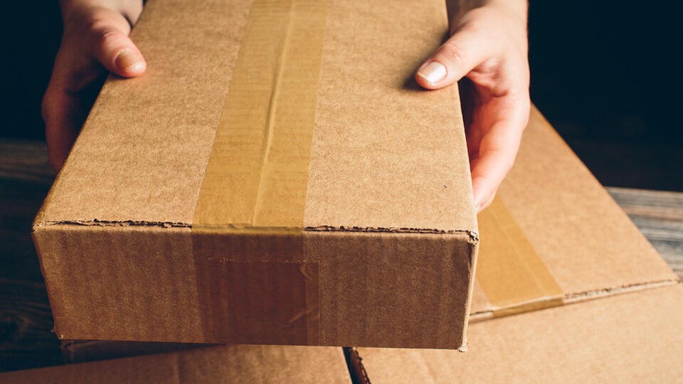Returns management 1 A plain, undamaged box ready for shipping and delivery