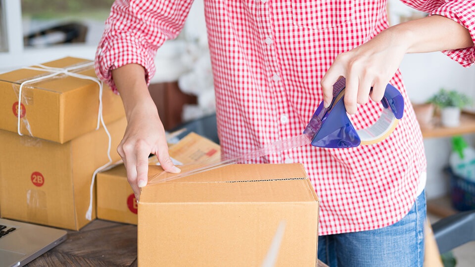 Man packing and shipping products