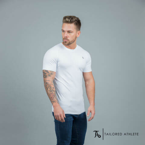 A model wearing a muscle-fit t-shirt from TAILORED ATHLETE