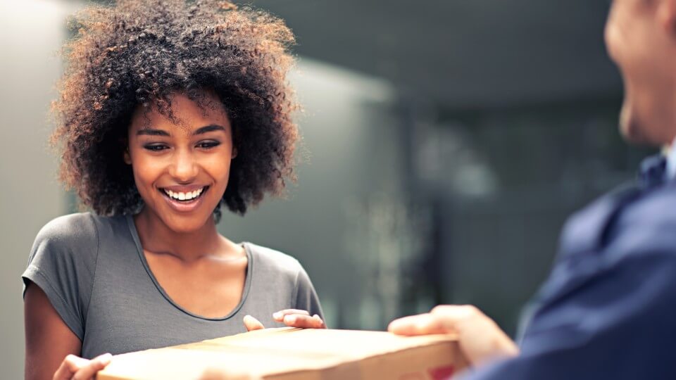 Hair and beauty fulfillment 2 A happy customer receives a parcel via a cosmetics, hair and beauty fulfillment service