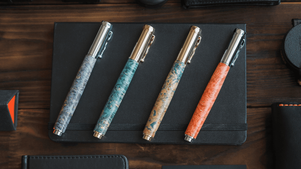 Luxury pens and notepads - examples of the stationery and gift products fulfilled by James and James