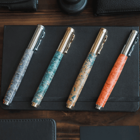 Luxury pens and notepads - examples of the stationery and gift products fulfilled by James and James