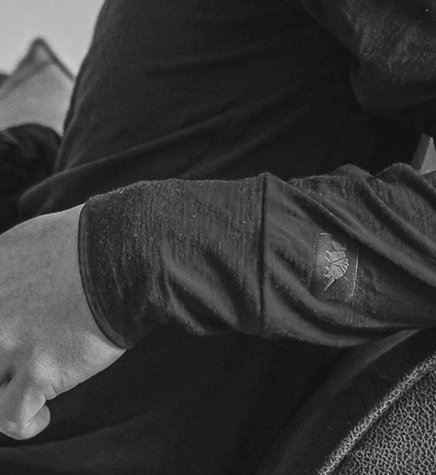 Close up shot of an Armadillo merino baselayer product's cuff and forearm