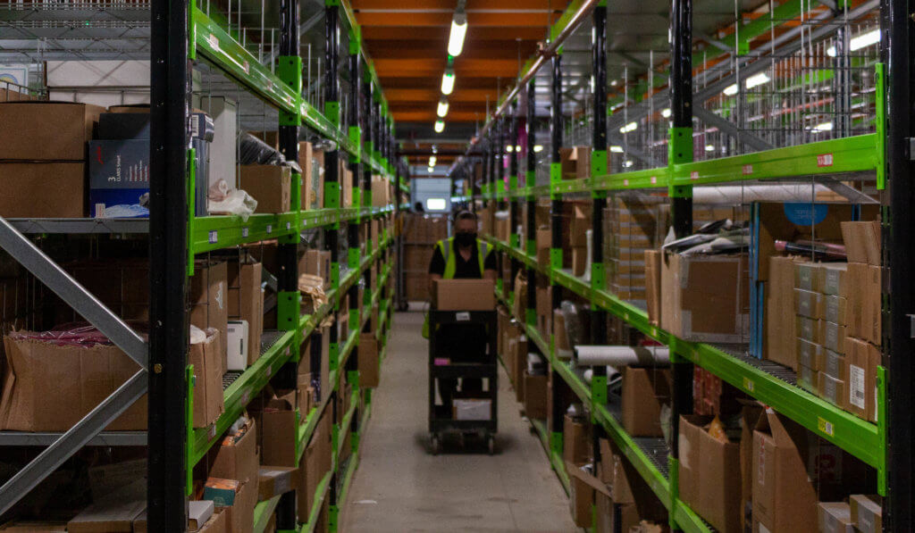 An employee picking orders in our fulfilment centre